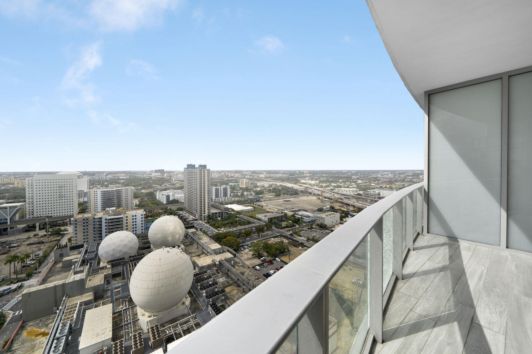 851 Northeast 1st Avenue, Unit 2410 Miami, FL 33132 - Photo 22 of 27 a view of a city from a balcony