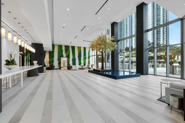 a view of lobby with furniture and floor to ceiling window