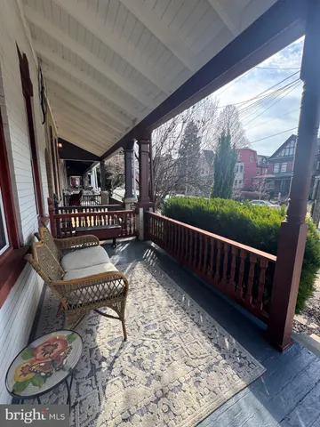 a view of a porch with furniture