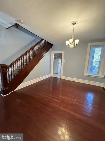 a view of livingroom with hardwood floor and window
