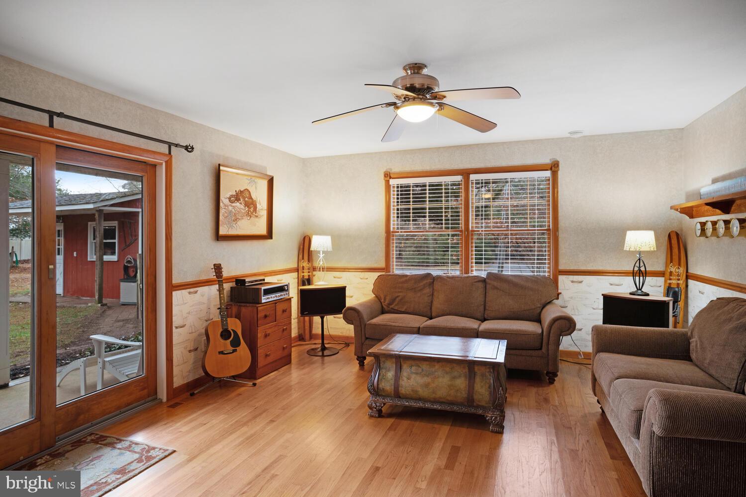 111 Mathis Drive Little Egg Harbor, NJ 08087 - Photo 22 of 38 a living room with furniture and a window