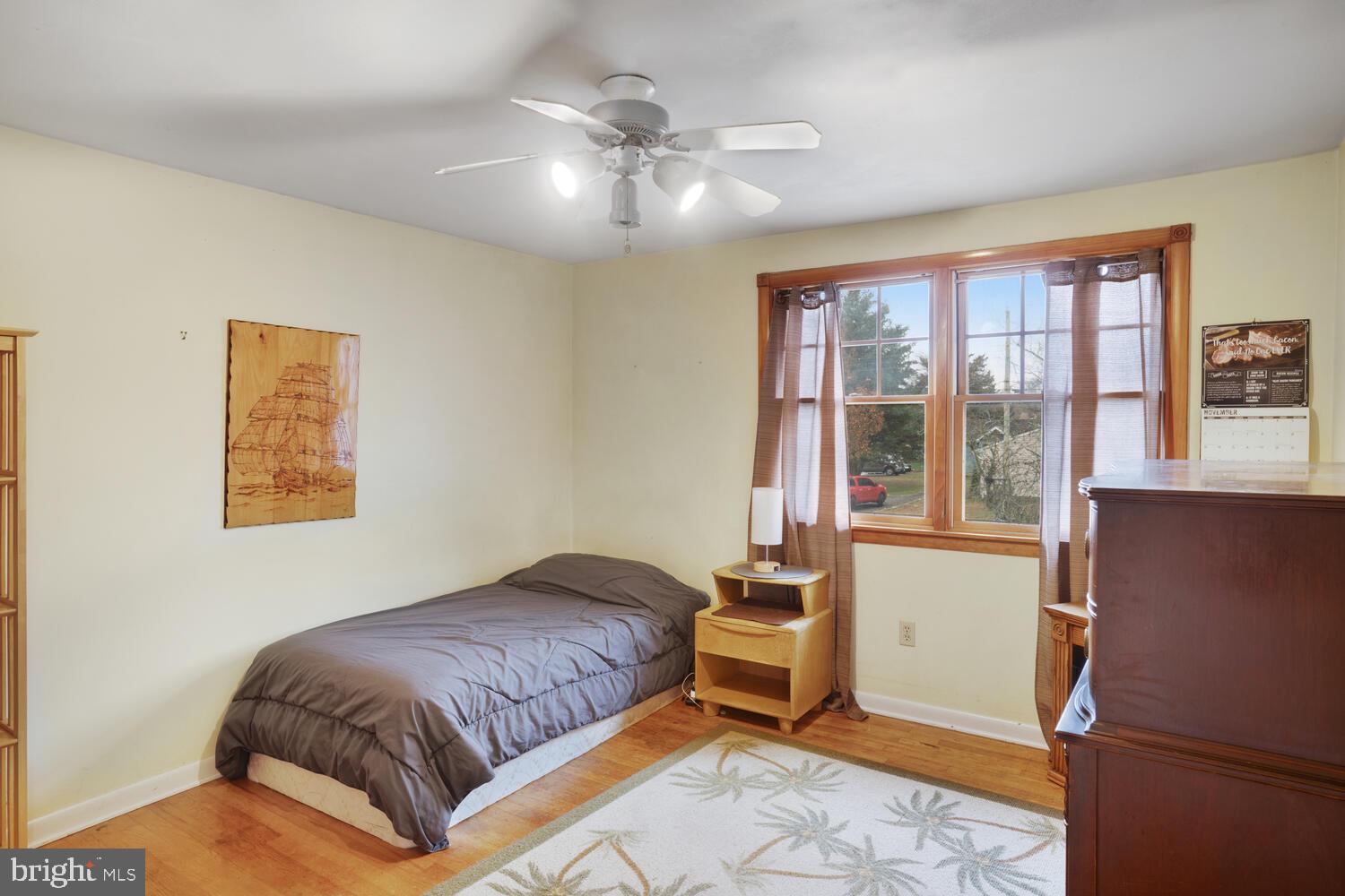 111 Mathis Drive Little Egg Harbor, NJ 08087 - Photo 36 of 38 a bedroom with a bed and window