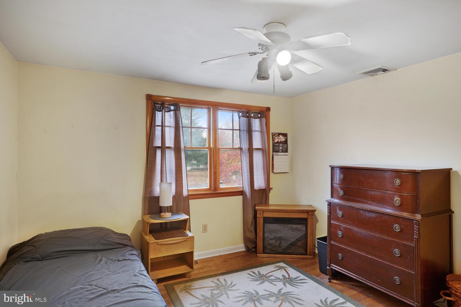 111 Mathis Drive Little Egg Harbor, NJ 08087 - Photo 37 of 38 a bedroom with a bed and a dresser