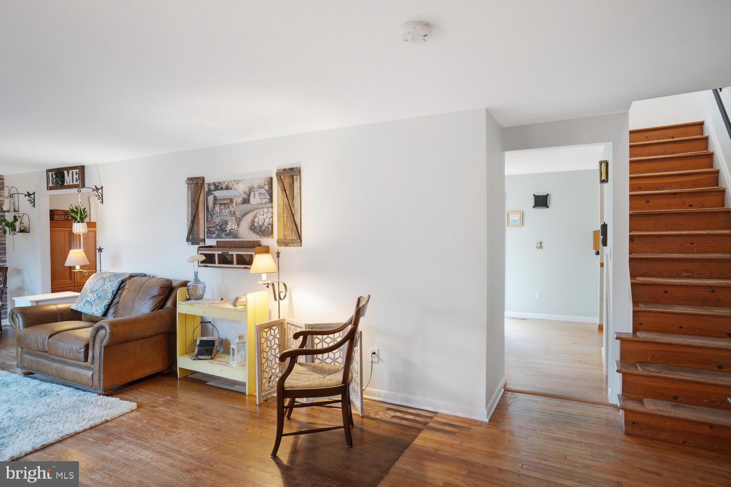 111 Mathis Drive Little Egg Harbor, NJ 08087 - Photo 8 of 38 a living room with furniture and a wooden floor
