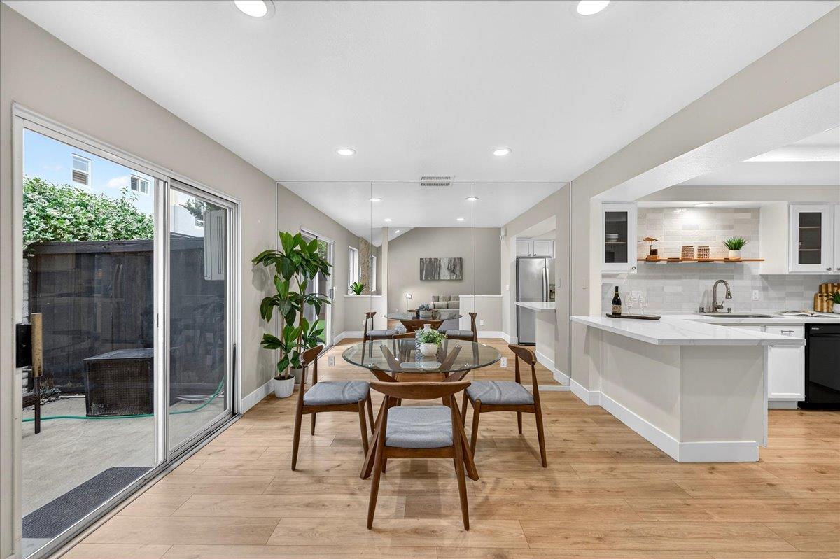 244 Rachael Place Pleasanton, CA 94566 - Photo 7 of 24 a view of a dining room with furniture window and wooden floor