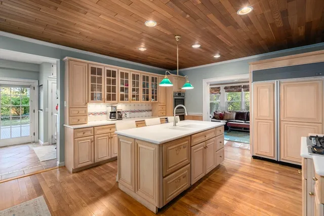 a kitchen with a stove and a sink