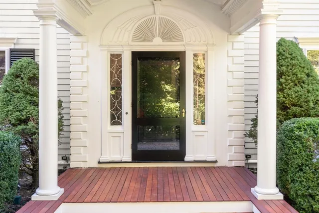 a front view of a house with a porch