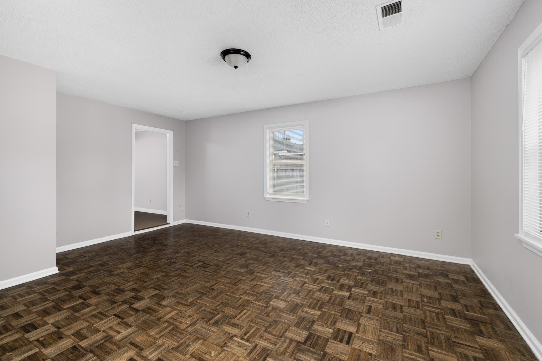 1584 South Perkins Road Memphis, TN 38117 - Photo 10 of 21 Unfurnished room with baseboards and visible vents