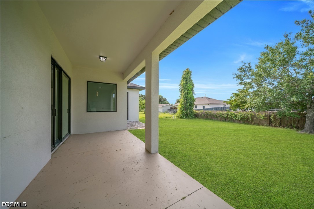 3509 38th Street Southwest Lehigh Acres, FL 33976 - Photo 33 of 47 a view of a porch with a yard