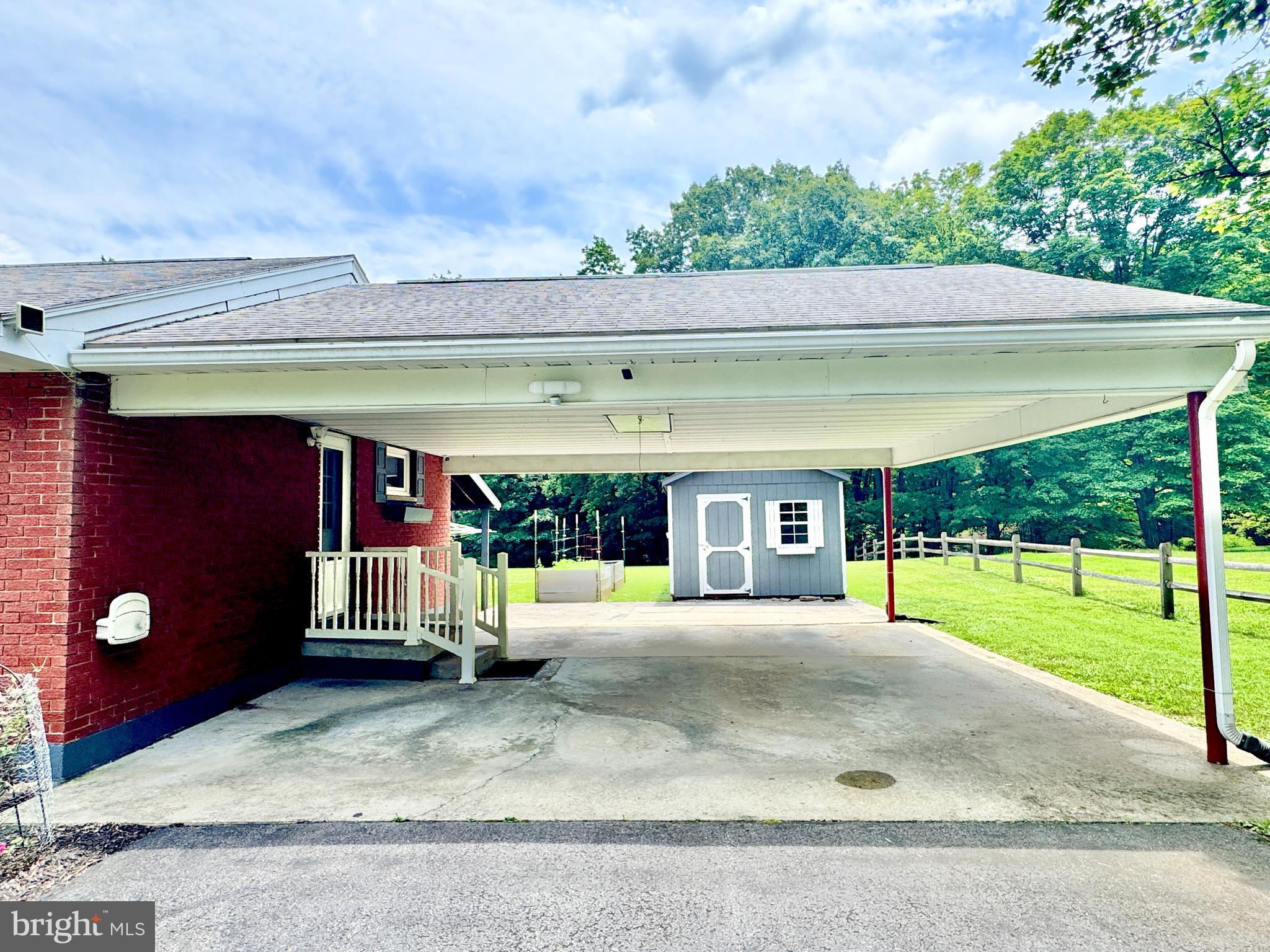 12602 Gramlich Road Southwest La Vale, MD 21502 - Photo 5 of 53 CARPORT, PERFECT FOR VECHICLES & GATHERINGS!