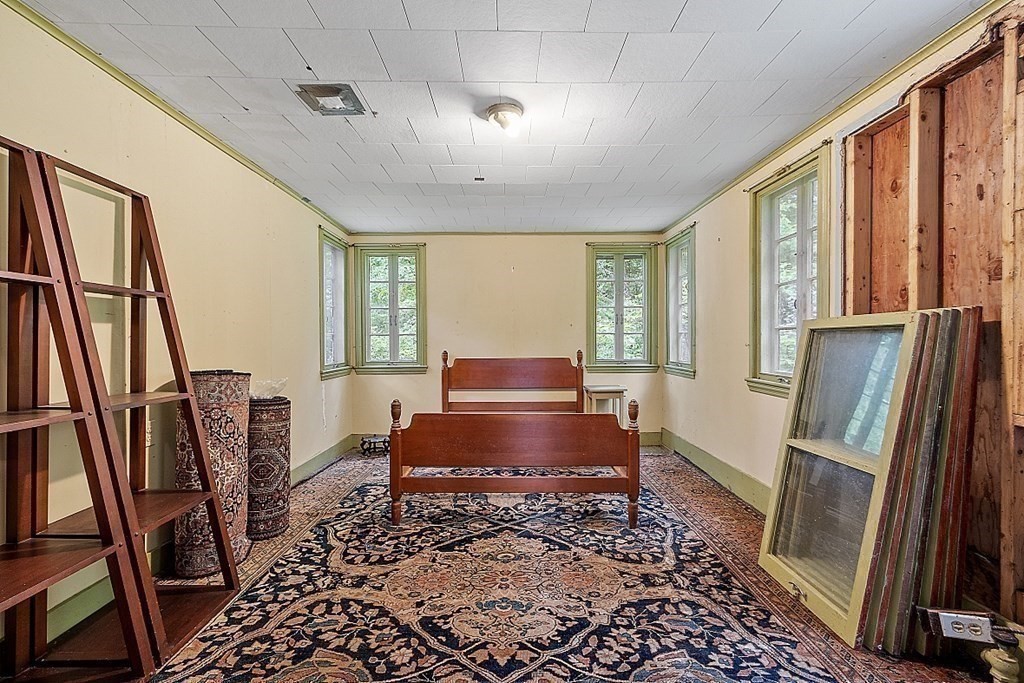 50 Sauna Row Road Townsend, MA 01474 - Photo 16 of 41 a living room with furniture and a rug