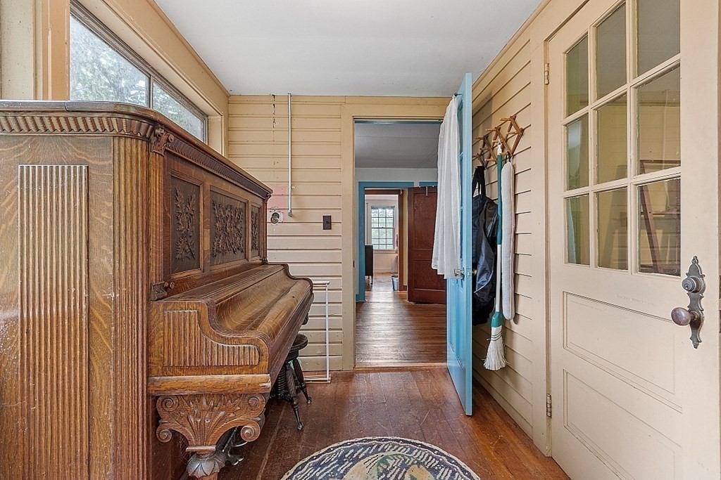 50 Sauna Row Road Townsend, MA 01474 - Photo 19 of 41 a view of a entryway door with hallway and wooden floor