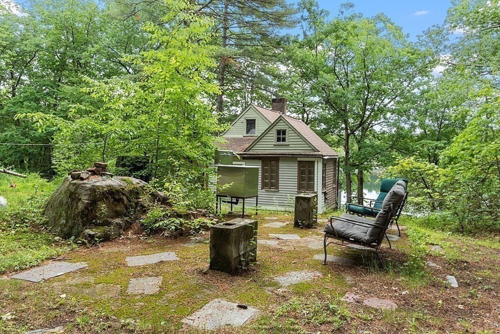 50 Sauna Row Road Townsend, MA 01474 - Photo 25 of 41 a front view of a house with a yard