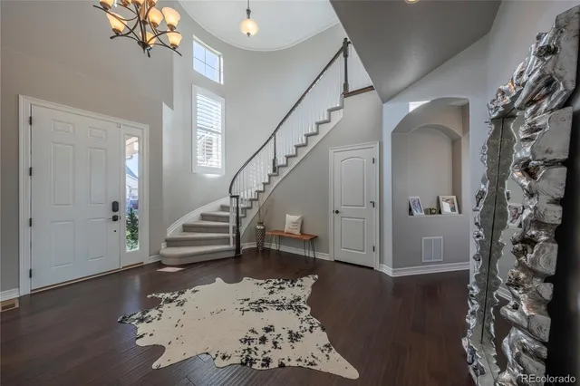 a view of entryway with wooden floor