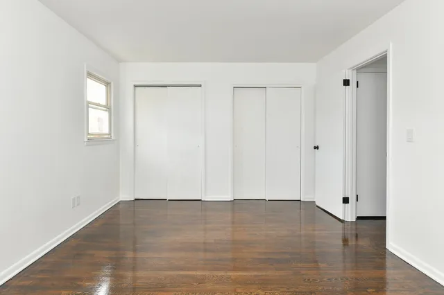 a view of room with hardwood floor