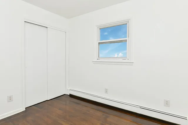an empty room with closet