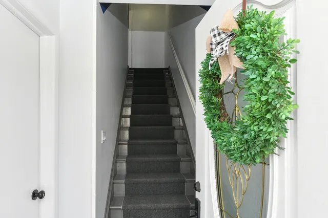 a view of entryway with wooden floor