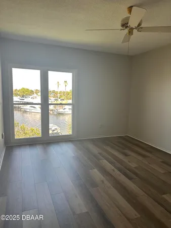 a bathroom with a sink toilet vanity and bathtub