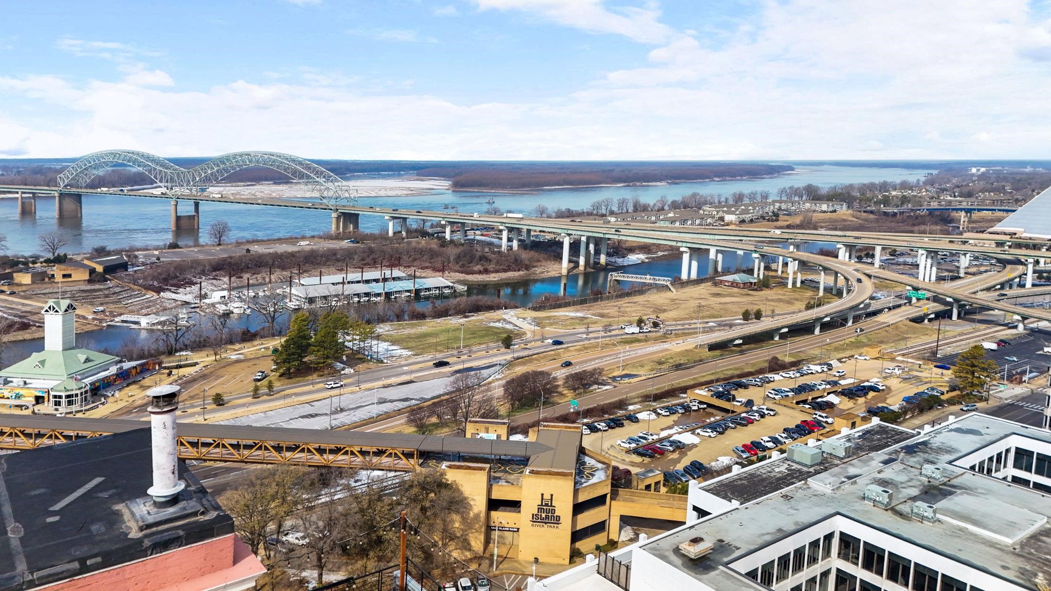 109 North Main Street, Unit 710 Memphis, TN 38103 - Photo 25 of 37 Drone / aerial view of a notable bridge and a large body of water