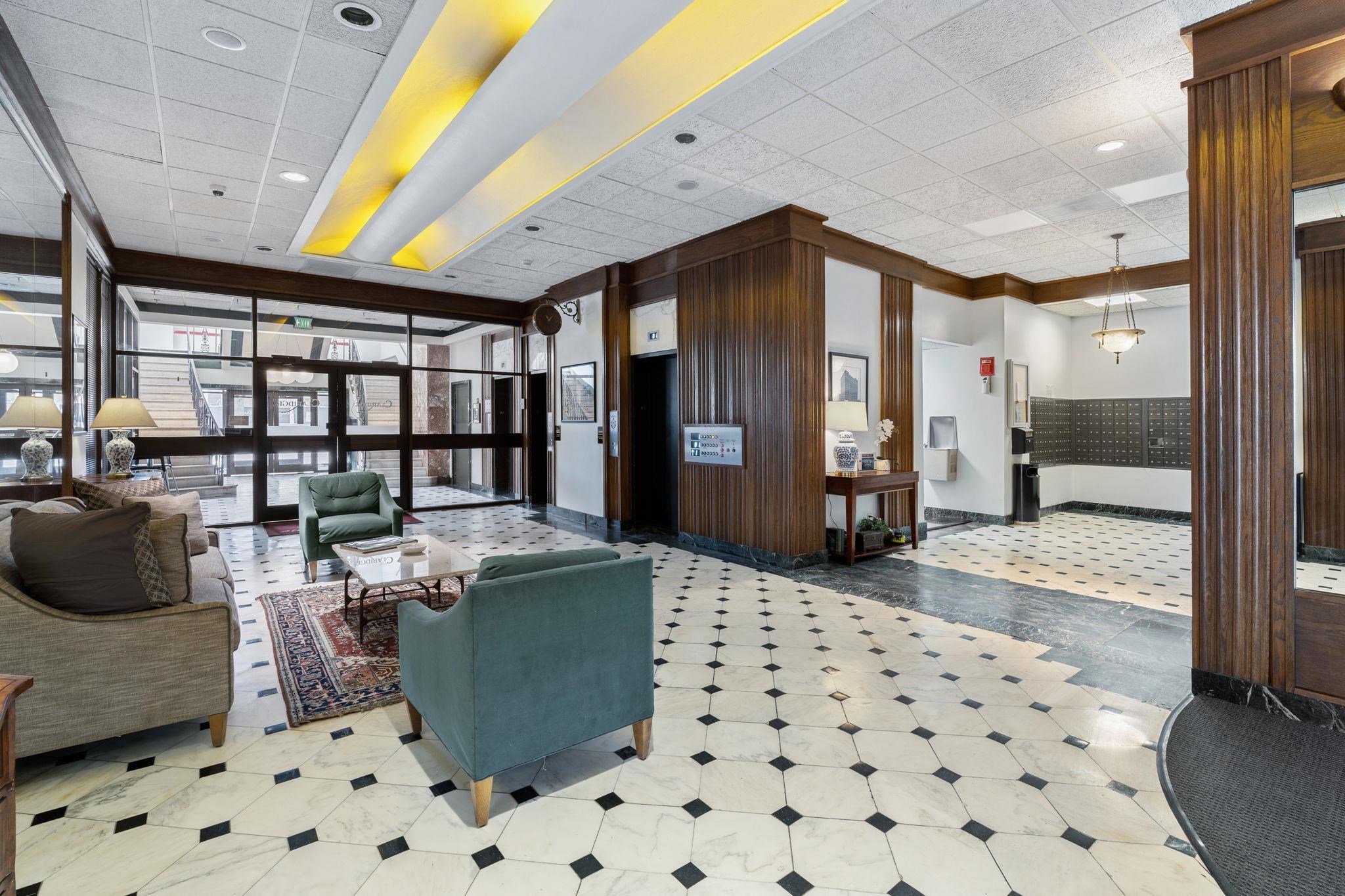 109 North Main Street, Unit 710 Memphis, TN 38103 - Photo 28 of 37 Common area with a drop ceiling and expansive windows