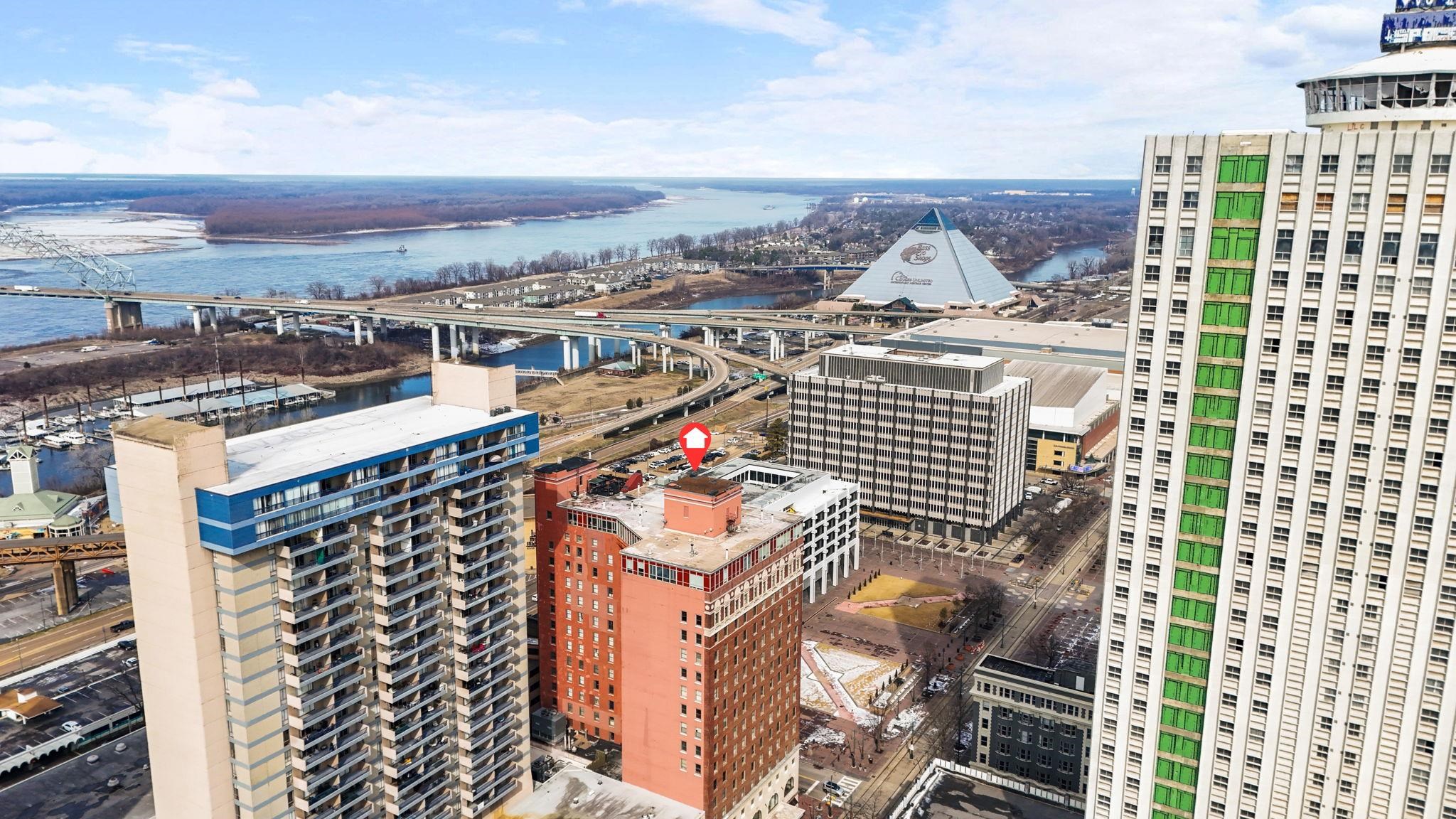 109 North Main Street, Unit 710 Memphis, TN 38103 - Photo 5 of 37 View of city featuring a large body of water and a notable bridge