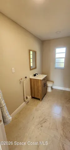 a view of a room with a sink