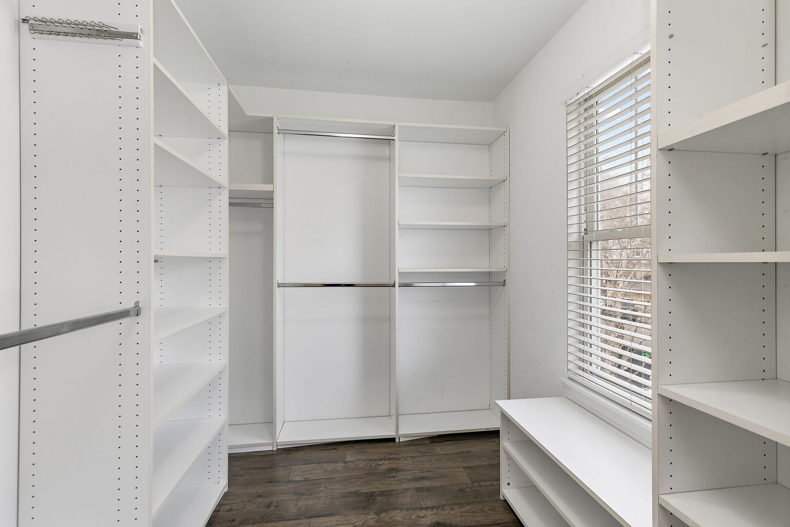 61 Samuel Drive Streamwood, IL 60107 - Photo 16 of 27 a view of walk in closet with empty racks