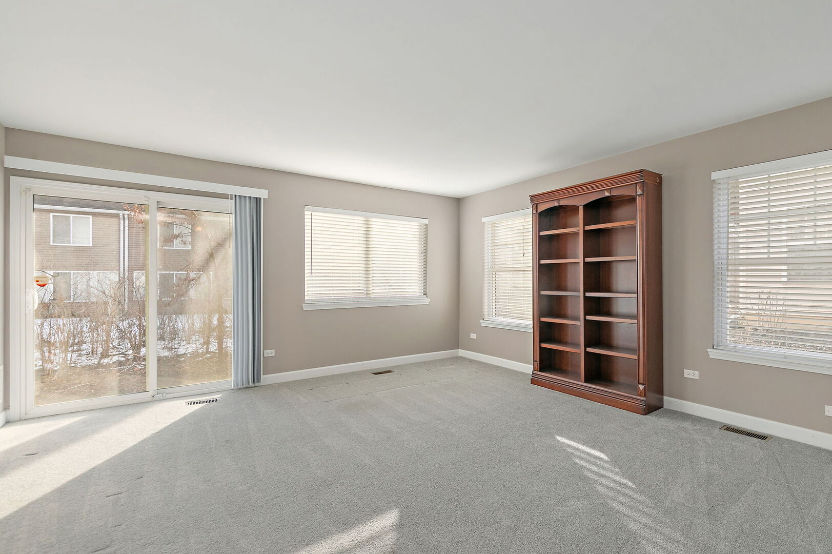 61 Samuel Drive Streamwood, IL 60107 - Photo 19 of 27 a view of an empty room with a window