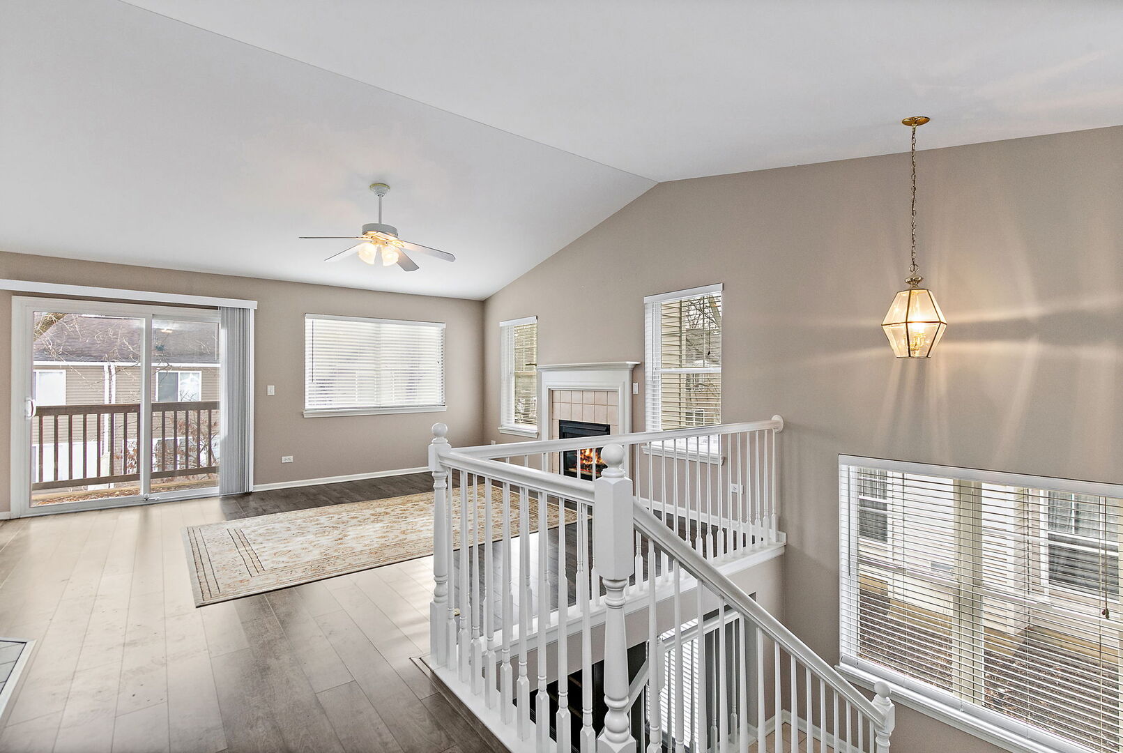 61 Samuel Drive Streamwood, IL 60107 - Photo 3 of 27 a view of a livingroom with wooden floor and windows