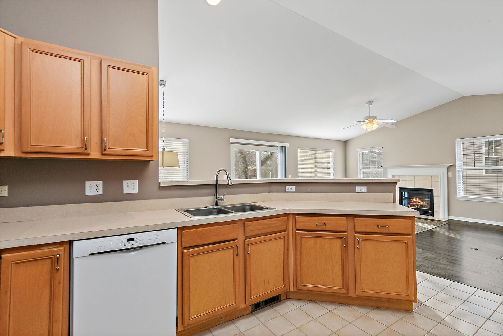 61 Samuel Drive Streamwood, IL 60107 - Photo 9 of 27 a kitchen with stainless steel appliances granite countertop a sink stove and cabinets