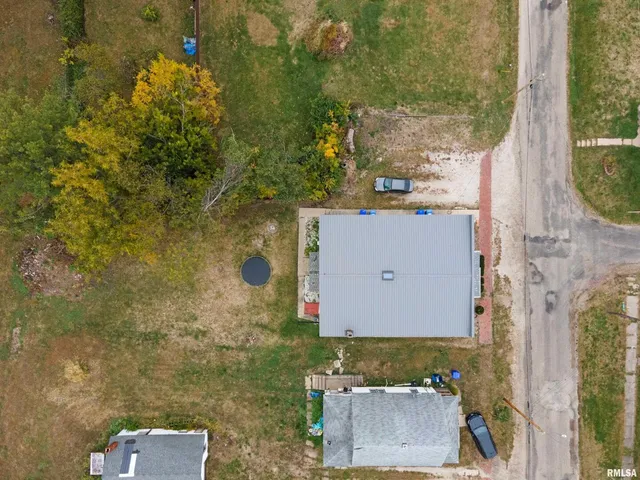 a view of a street with cars