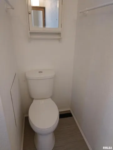 a kitchen with stainless steel appliances granite countertop a refrigerator a stove top oven a sink and dishwasher