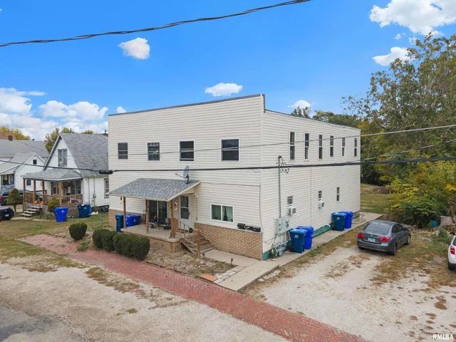 an aerial view of a house with garden