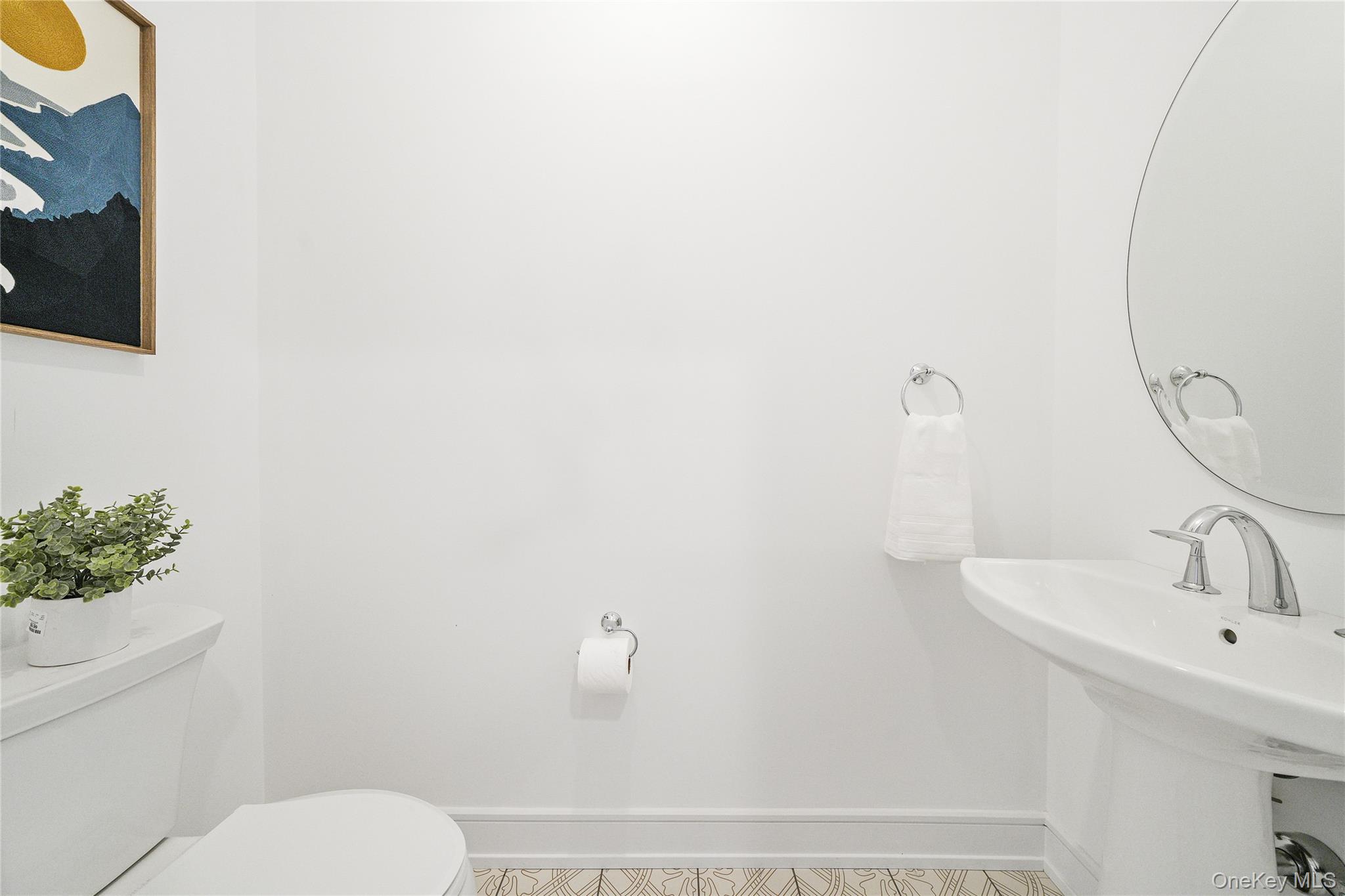 2040 Crompond Road, Unit 22 Yorktown Heights, NY 10598 - Photo 9 of 19 a bathroom with a sink and mirror with toilet