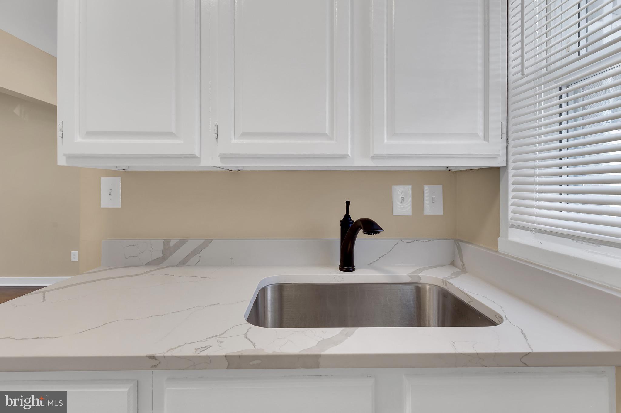 151 Darrington Street Southwest Washington, DC 20032 - Photo 16 of 22 a close view of sink and tap