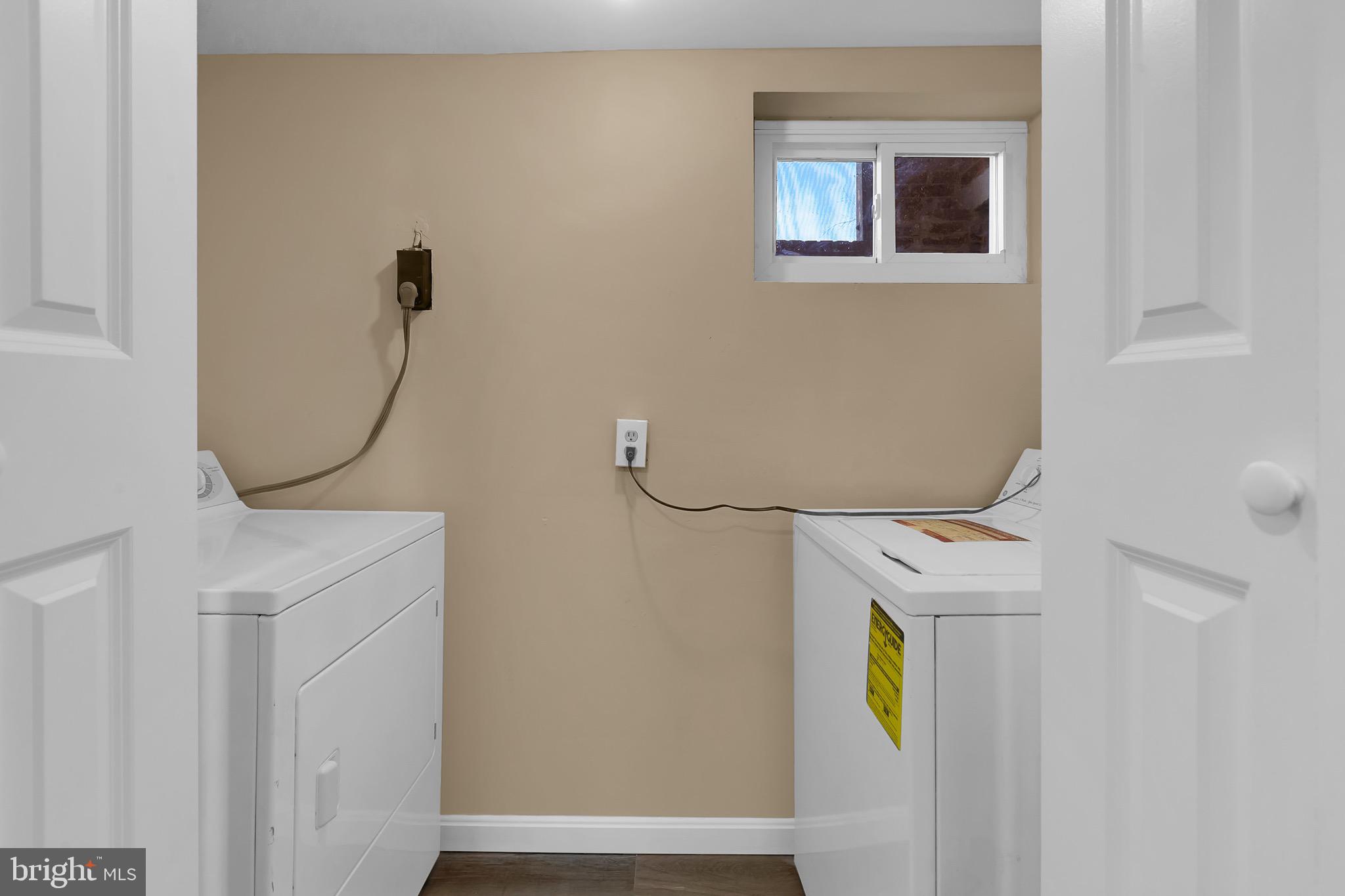 151 Darrington Street Southwest Washington, DC 20032 - Photo 22 of 22 a room with a washer and dryer