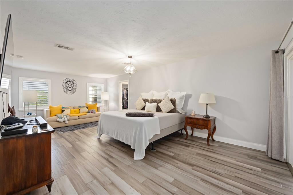 5025 Marsh Field Road Sarasota, FL 34235 - Photo 21 of 69 a living room with furniture and a wooden floor