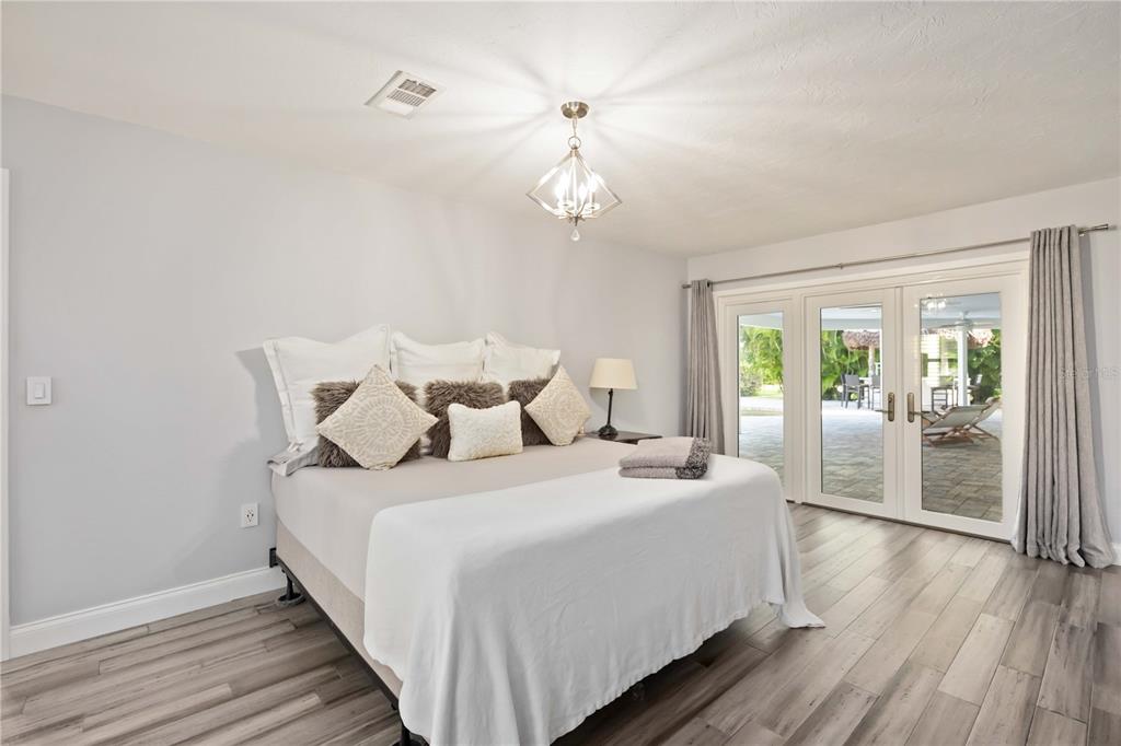 5025 Marsh Field Road Sarasota, FL 34235 - Photo 22 of 69 a bedroom with bed and window