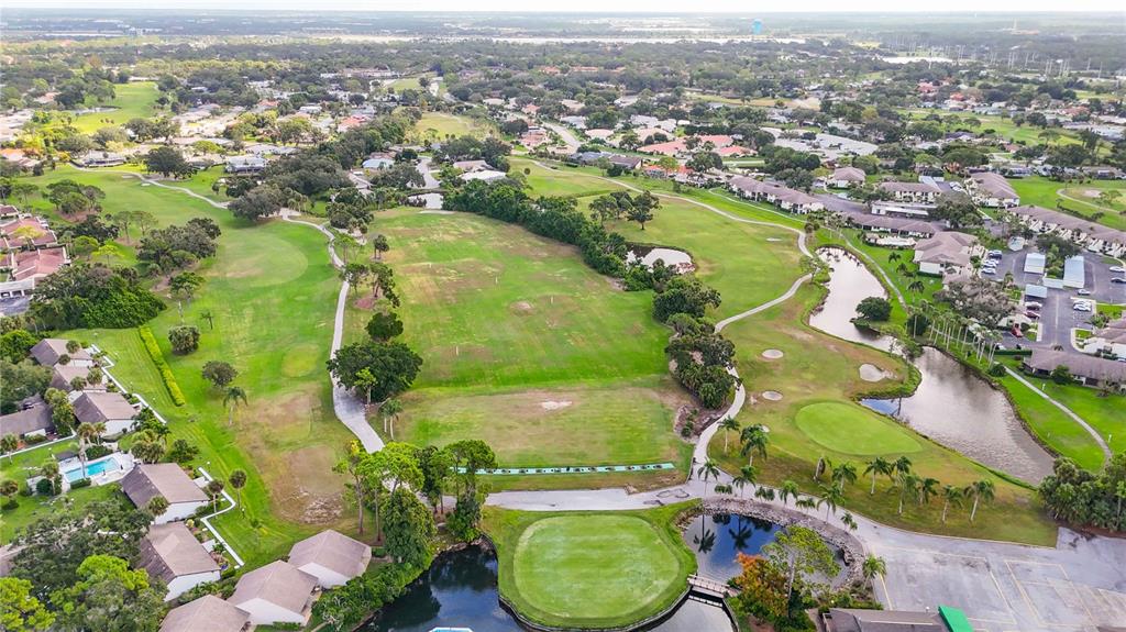 5025 Marsh Field Road Sarasota, FL 34235 - Photo 65 of 69 an aerial view of residential houses with outdoor space