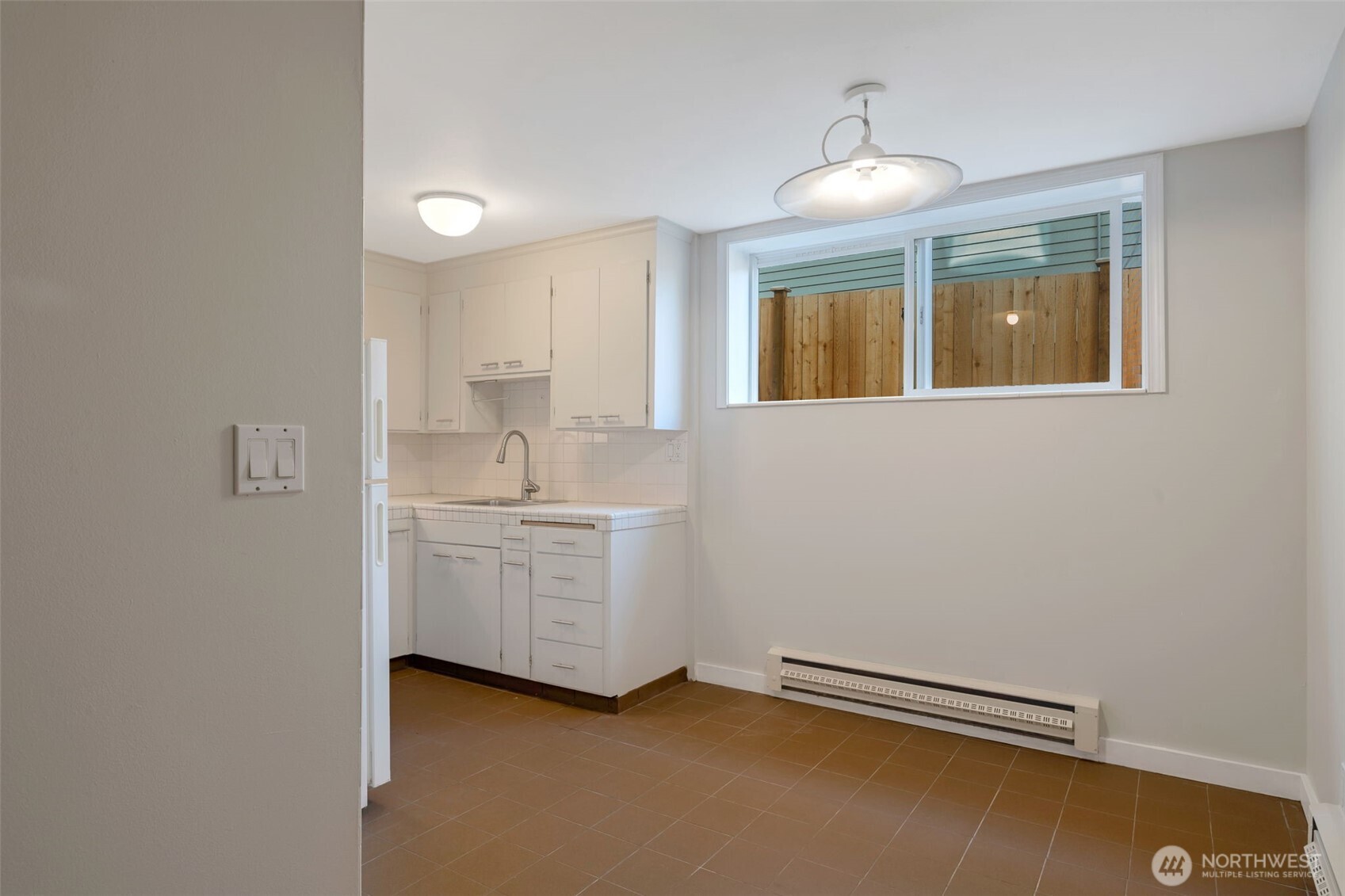 4324 Phinney Avenue North, Unit 1 Seattle, WA 98103 - Photo 13 of 20 a room with sink and window