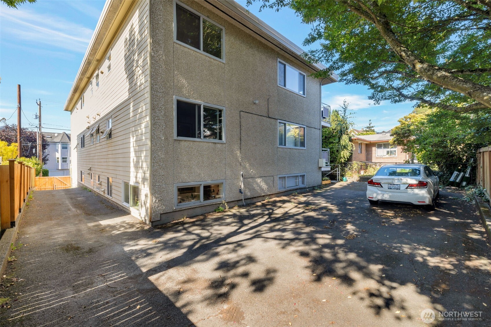 4324 Phinney Avenue North, Unit 1 Seattle, WA 98103 - Photo 15 of 20 a view of a house with a patio