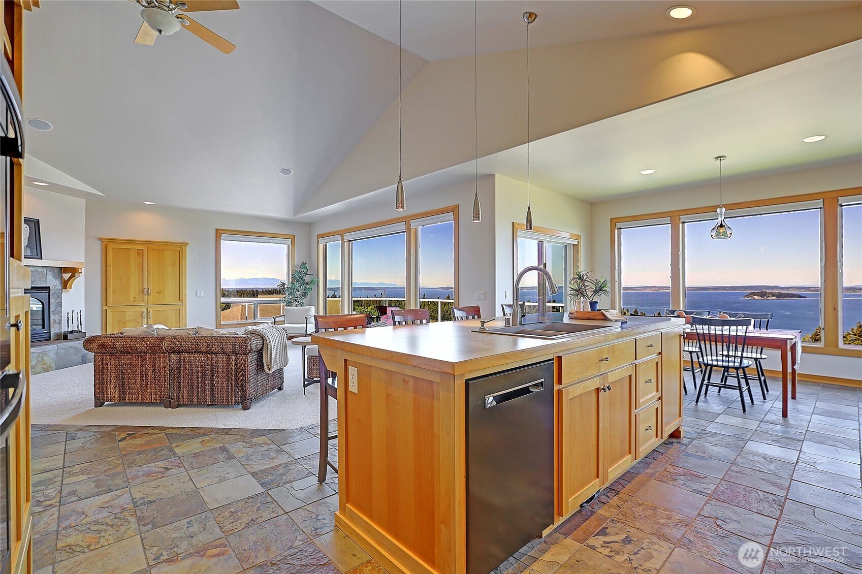 1081 Morgan Way Camano Island, WA 98282 - Photo 12 of 39 a kitchen with stainless steel appliances granite countertop a sink and a refrigerator