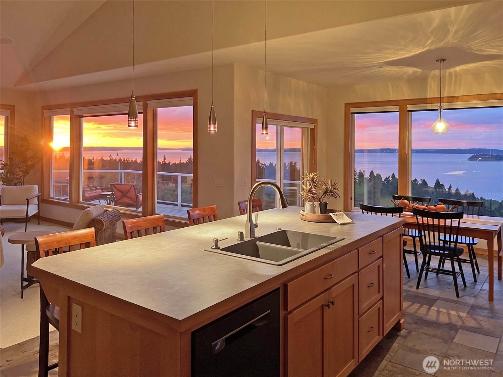 1081 Morgan Way Camano Island, WA 98282 - Photo 13 of 39 a kitchen with a sink a counter and chairs