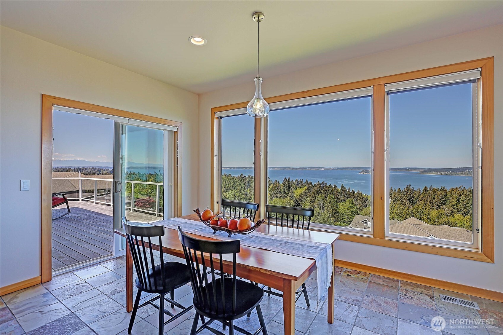 1081 Morgan Way Camano Island, WA 98282 - Photo 17 of 39 a dining room with furniture and window