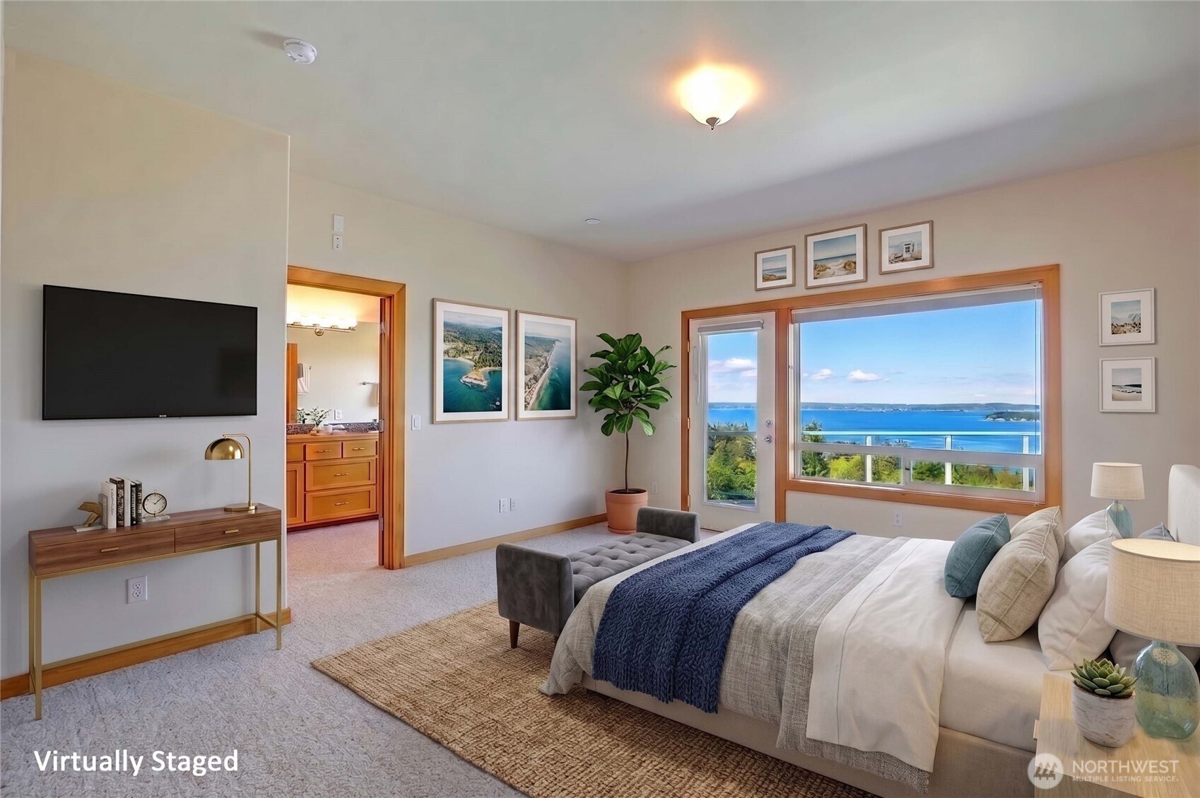 1081 Morgan Way Camano Island, WA 98282 - Photo 19 of 39 a bedroom with a bed and large windows