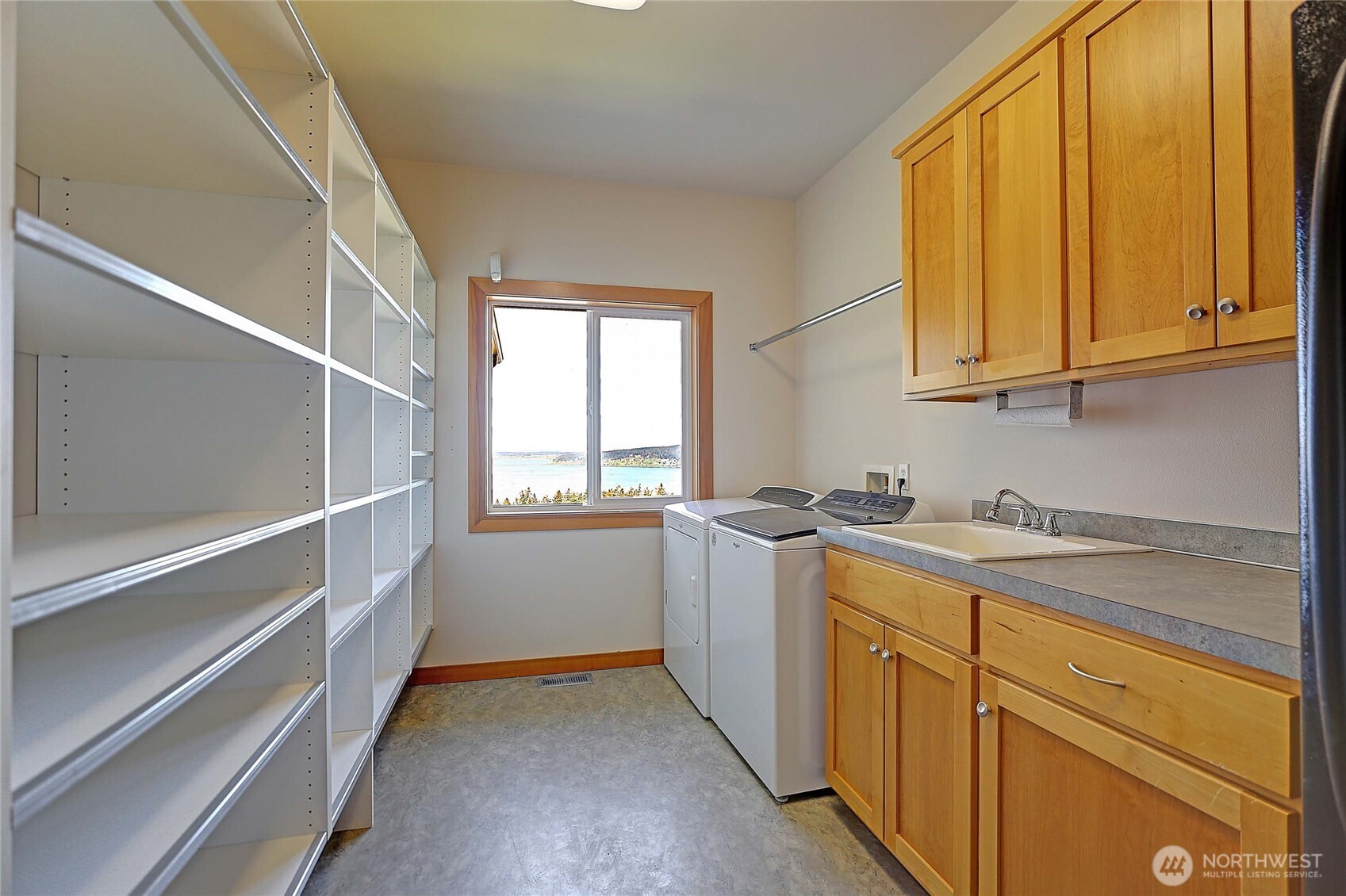1081 Morgan Way Camano Island, WA 98282 - Photo 25 of 39 a view of a kitchen with sink and cabinets