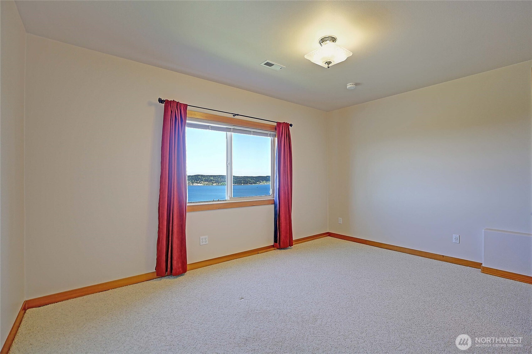 1081 Morgan Way Camano Island, WA 98282 - Photo 29 of 39 a view of an empty room with a window