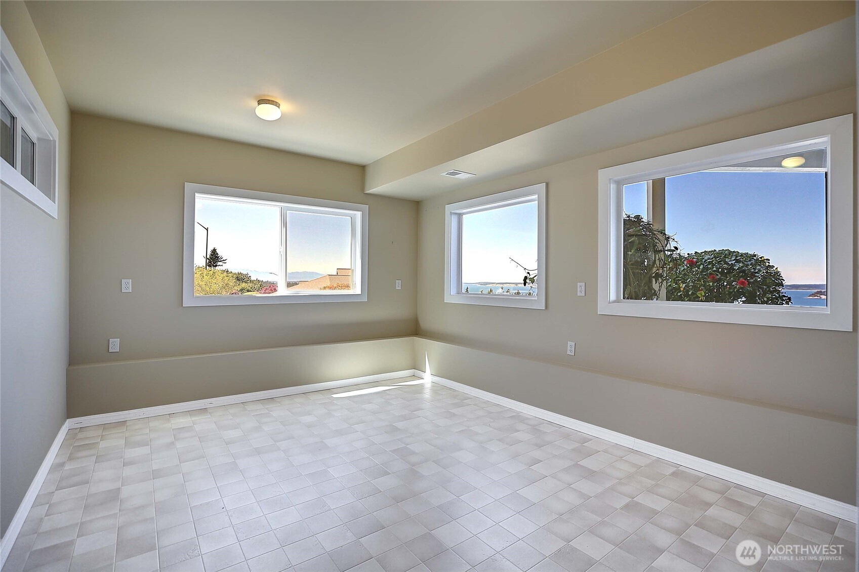 1081 Morgan Way Camano Island, WA 98282 - Photo 32 of 39 a view of an empty room with a window