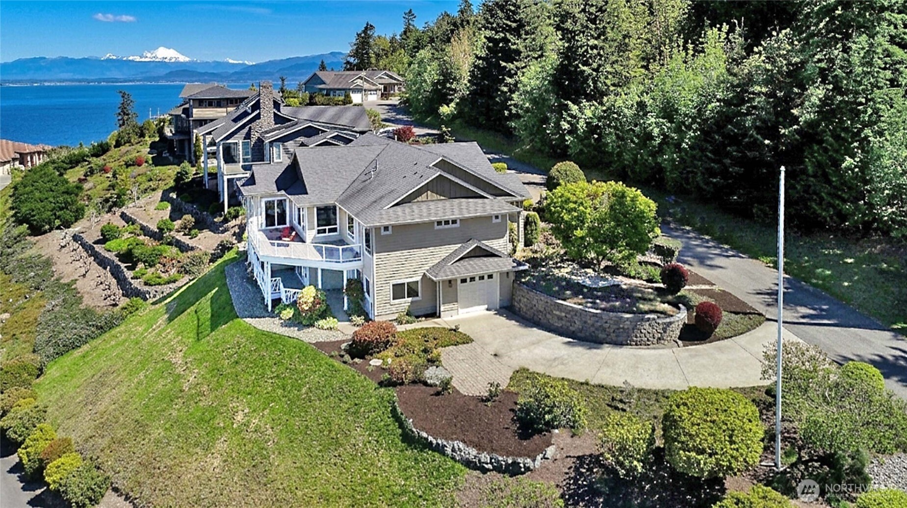 1081 Morgan Way Camano Island, WA 98282 - Photo 37 of 39 a view of a house with a yard and garden