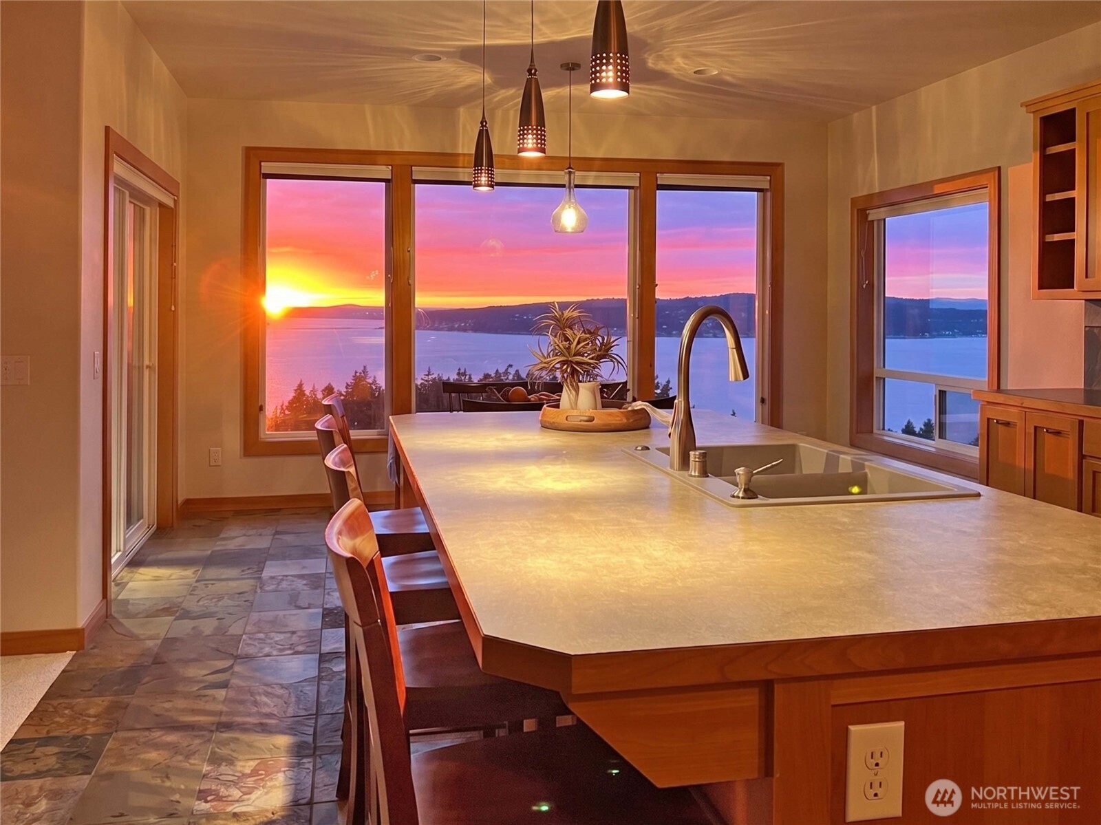 1081 Morgan Way Camano Island, WA 98282 - Photo 4 of 39 a view of a dining room with furniture